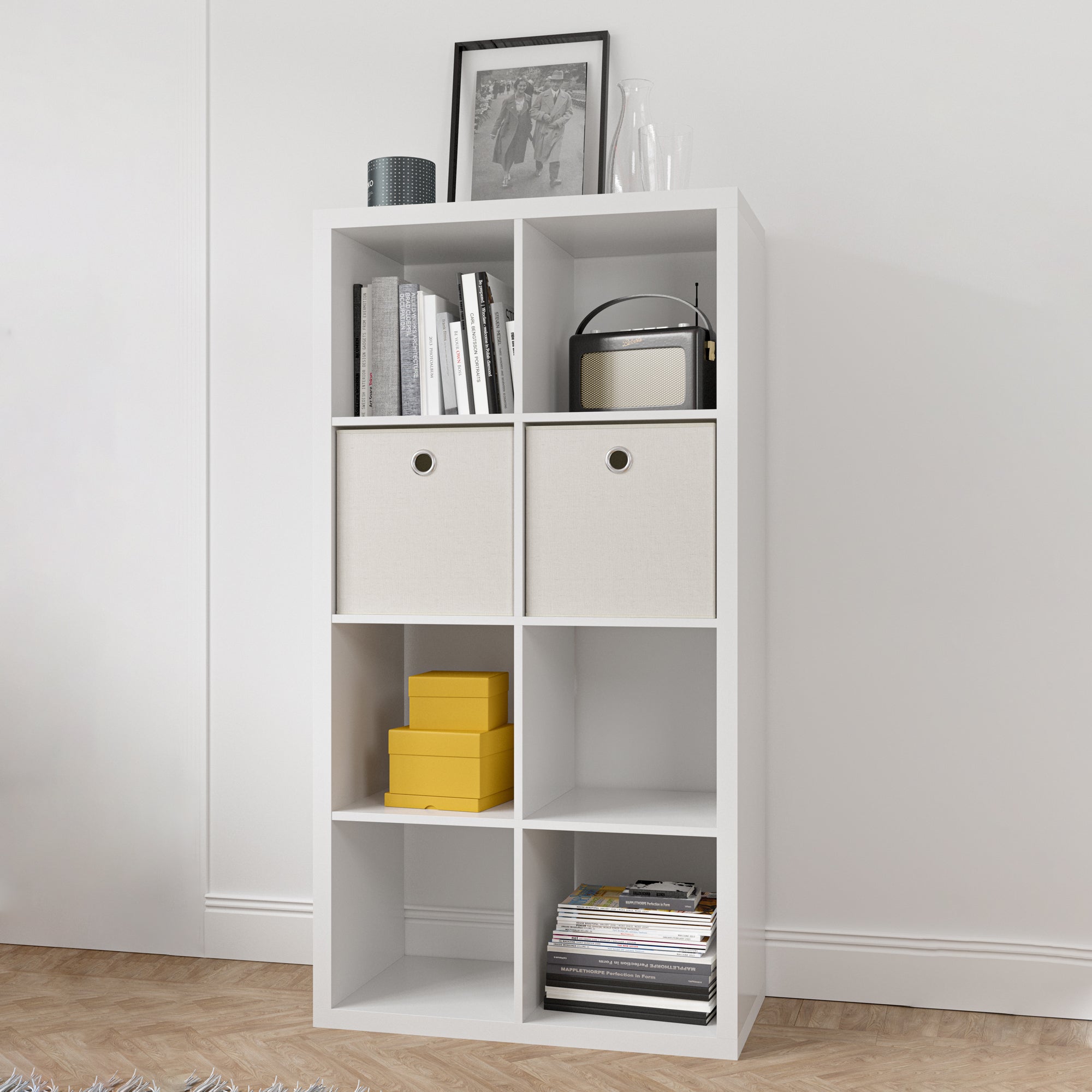 White 8-cube organizer shelf used in a modern home office