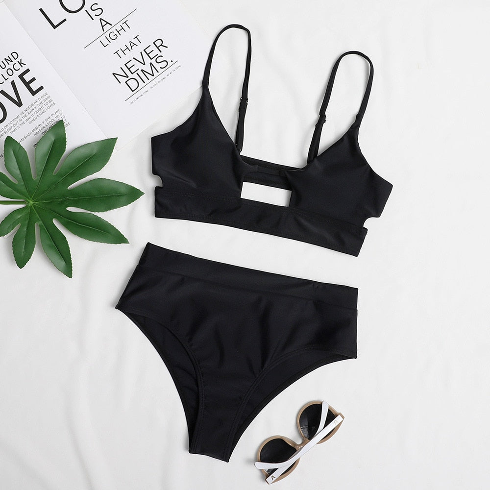 Surf Siren high-waist bikini featuring a retro-inspired design with a flattering high-waisted bottom for added comfort and support. Made from stretchy, durable fabric, perfect for beach days, poolside lounging, and stylish summer fun.