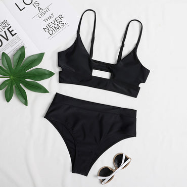 Surf Siren high-waist bikini featuring a retro-inspired design with a flattering high-waisted bottom for added comfort and support. Made from stretchy, durable fabric, perfect for beach days, poolside lounging, and stylish summer fun.