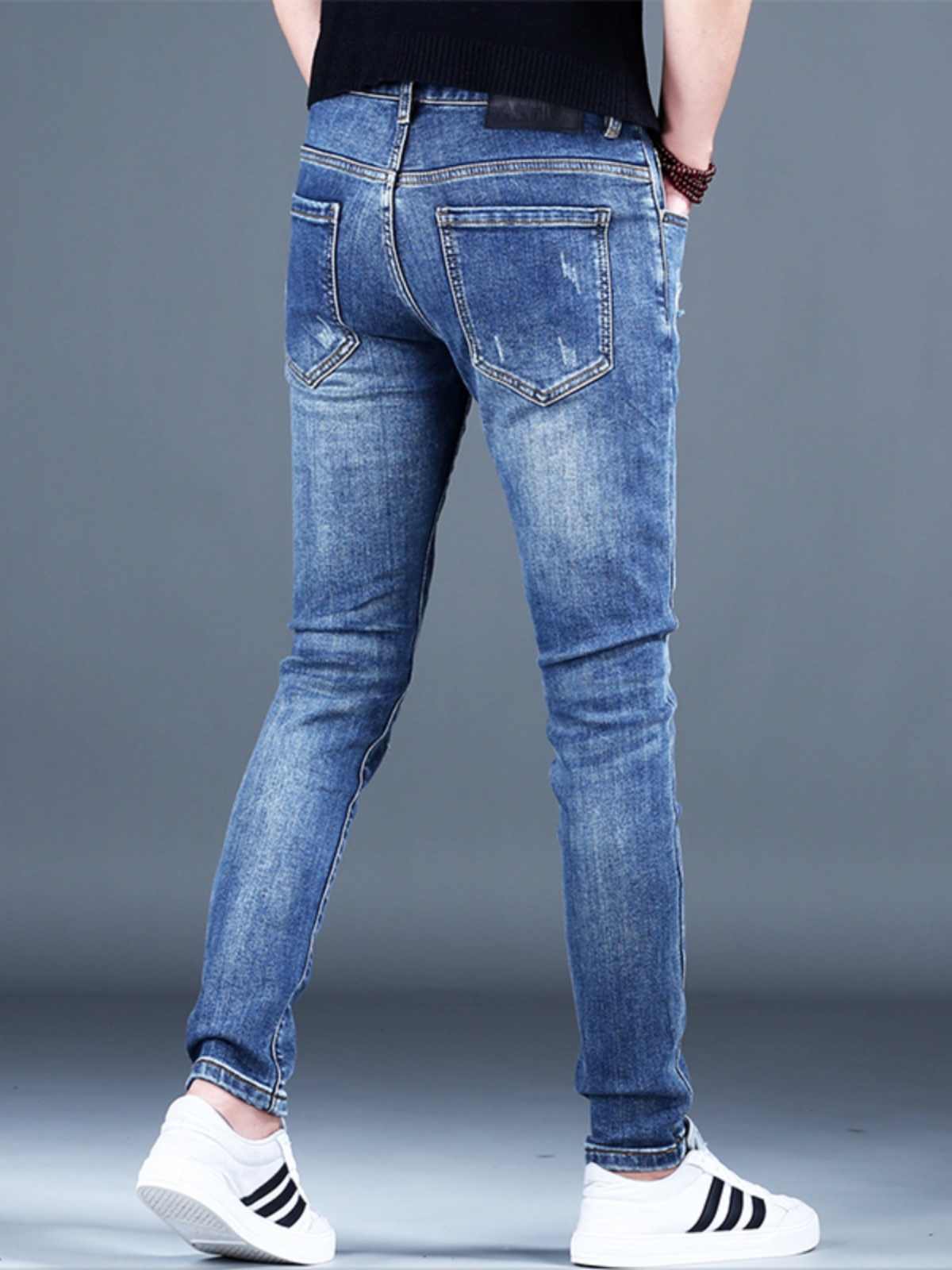 Men’s Ripped Fleece Padded Jeans – slim-fit, stretchable, and fleece-lined for warmth and style.