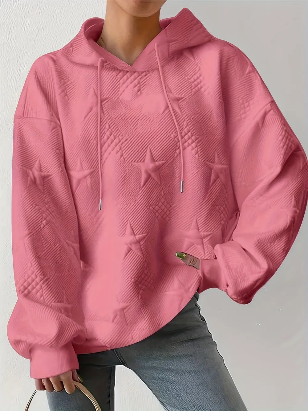 White women’s casual pullover hoodie with star texture and drawstring hood.








