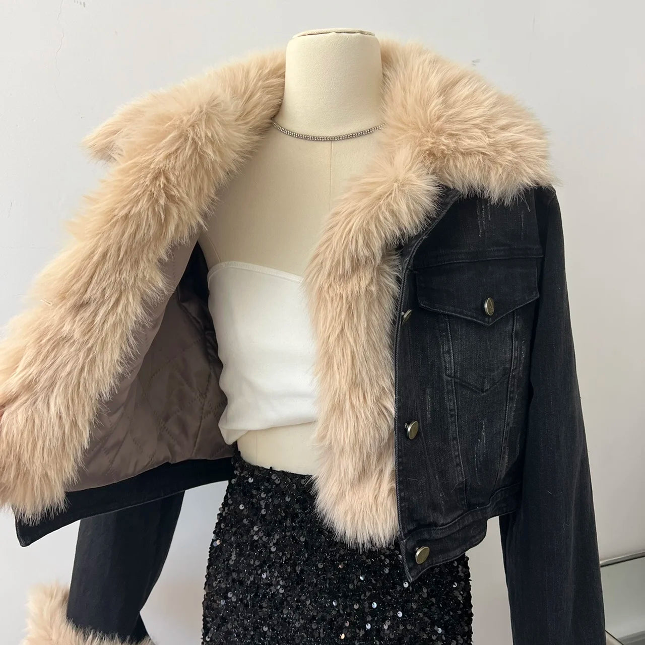 Model wearing the Temperament O-neck lambswool fur coat with contrast color design