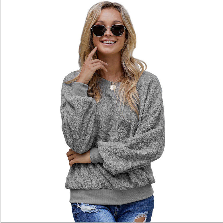 Women's solid color pullover, long-sleeve round-neck loose casual top for autumn and winter.








