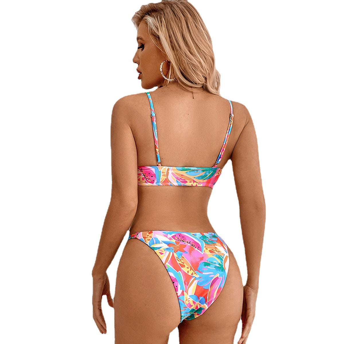 Tropical Breeze bikini featuring a vibrant, tropical-inspired design with a flattering fit. Made from high-quality, stretchy fabric for comfort and support, perfect for beach days, poolside lounging, and summer vacations.