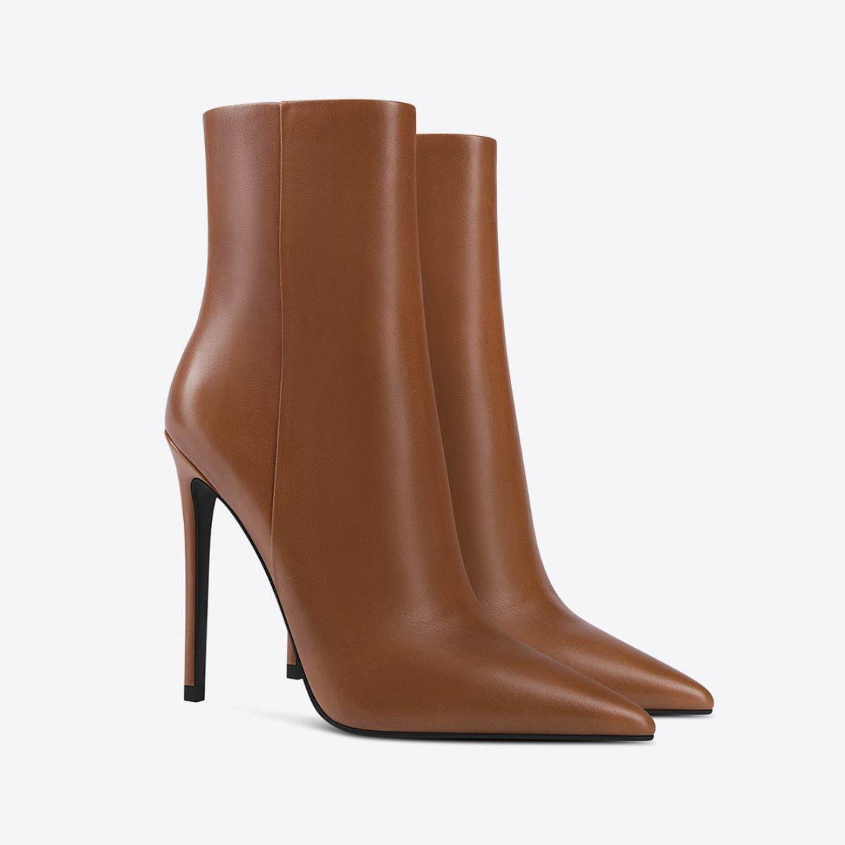 European and American Pointed-Toe Stiletto Ankle Boots – Chic and elegant ankle boots with a pointed toe and stiletto heel for a sophisticated look.








