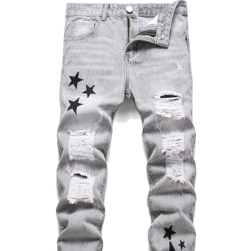 Men's slim-fit moto jeans featuring distressed knees and zipper accents