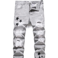 Men's slim-fit moto jeans featuring distressed knees and zipper accents