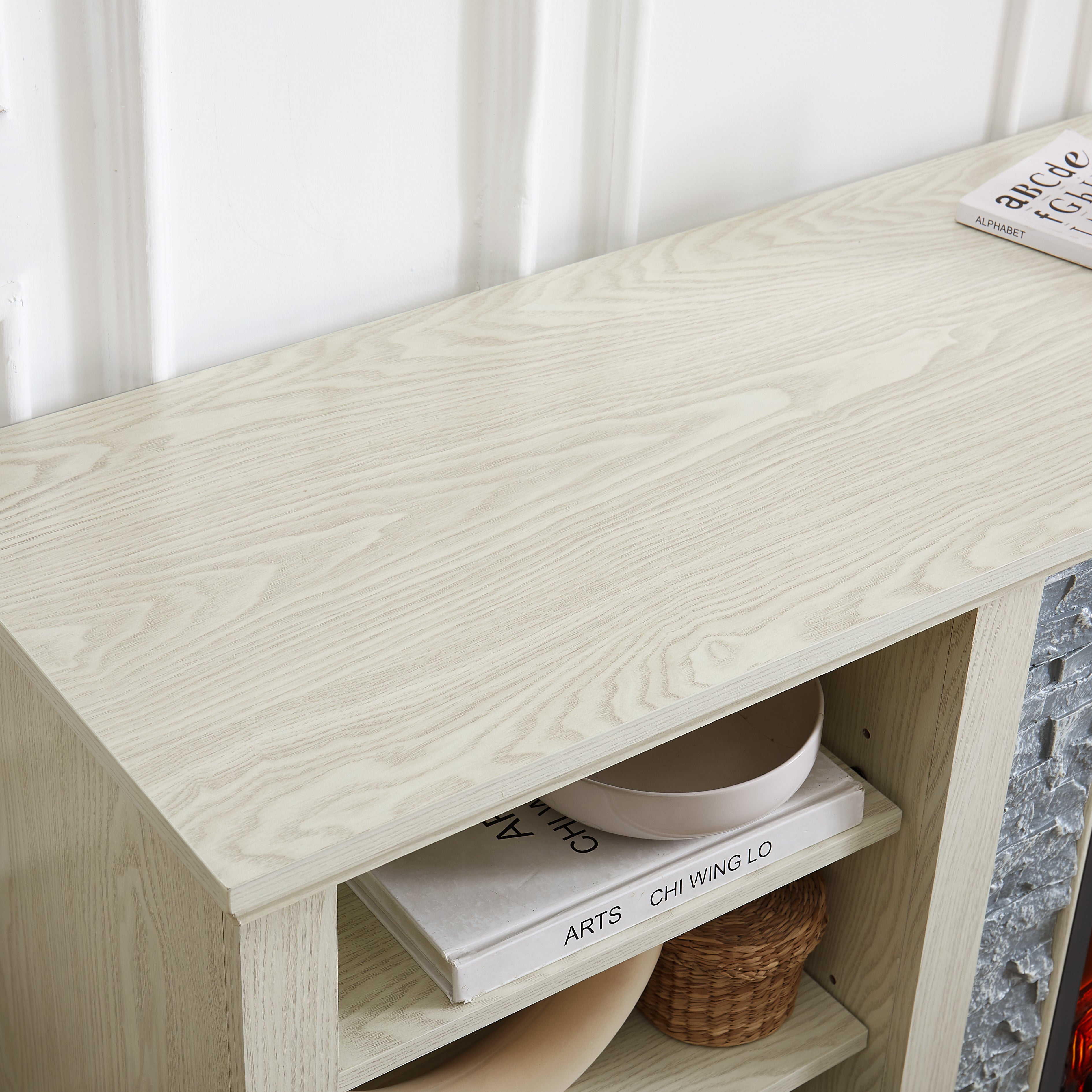 White TV stand with electric fireplace and stone-look mantel