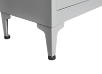 Grey metal kitchen storage cabinet with door and adjustable shelf in a modern kitchen