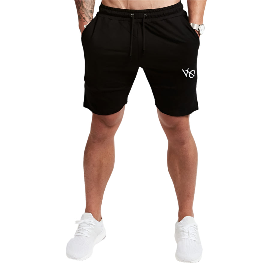 "Men's workout running shorts made from lightweight, moisture-wicking fabric for comfort and breath ability. The shorts feature an elastic waistband with an adjustable drawstring, side pockets, and a relaxed fit, perfect for running or intense workout sessions."