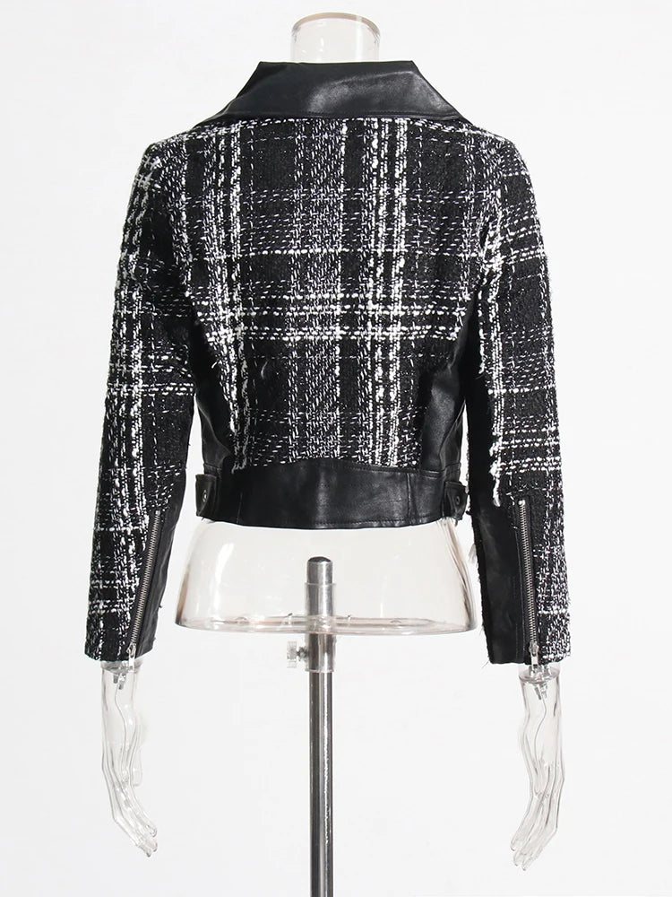 Colorblock women's coat with leather and tweed patchwork, lapel collar, long sleeves, and front zipper.

