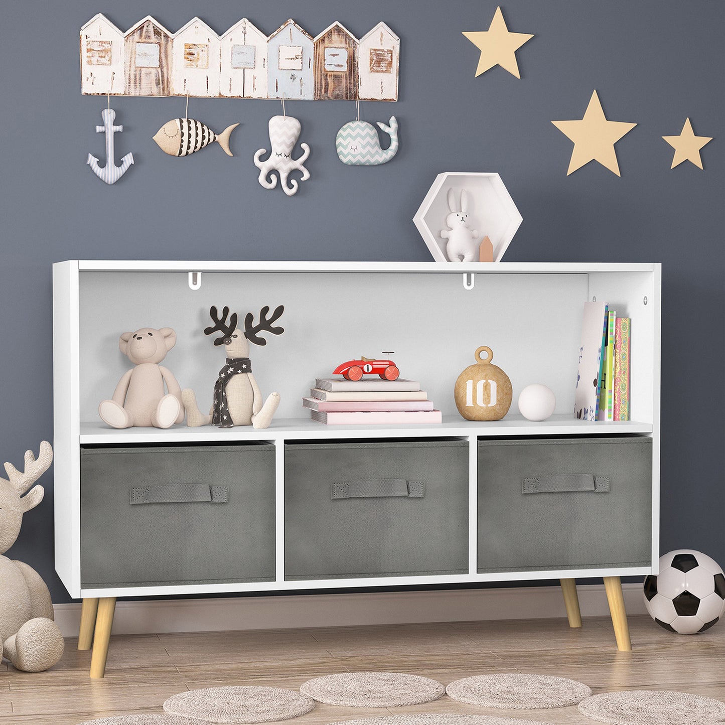 White kids bookcase with gray fabric drawers and books displayed