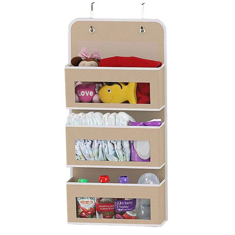 5-pocket hanging organizer on the back of a white bedroom door

