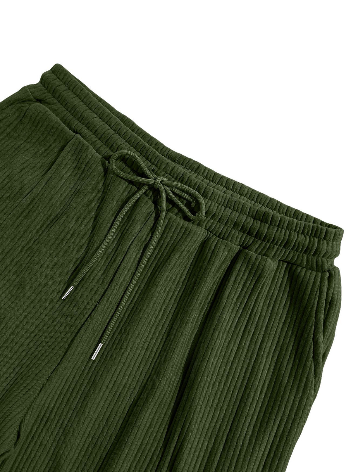 Close-up of olive green pleated pants showing the elastic drawstring waistband and ribbed fabric texture against a white background.