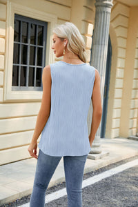 Women’s sleeveless V-neck tank top with button design in solid color, perfect for casual or dressy summer looks.









