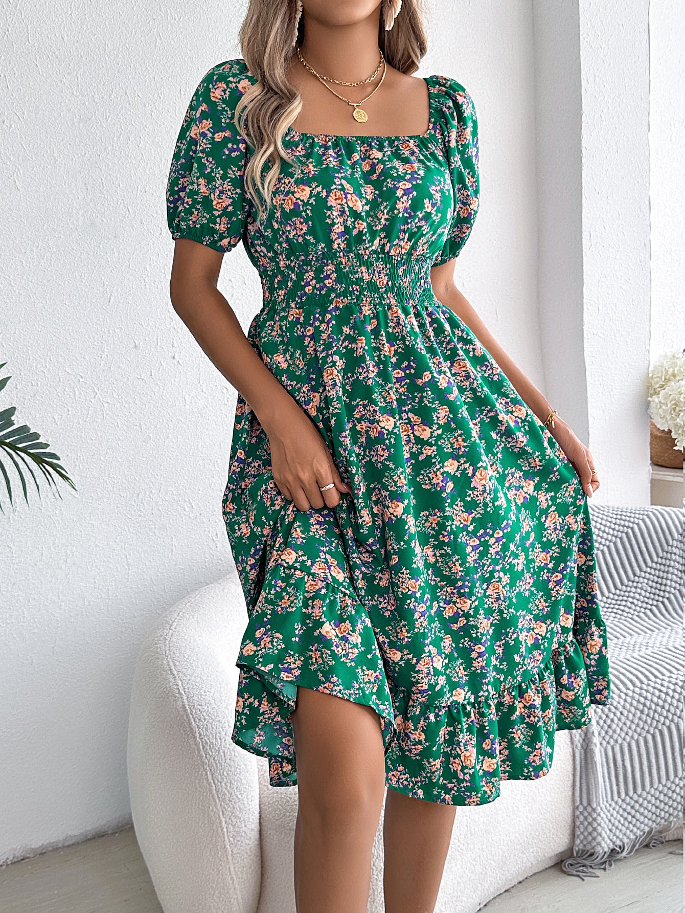 Women's floral print square collar dress with ruffle details, perfect for summer fashion and casual outings.

