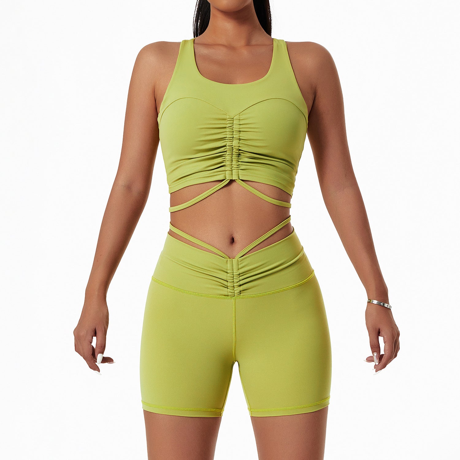 Woman wearing a stylish yoga set with drawstring collar top and fitted leggings, ideal for gym or yoga sessions.

