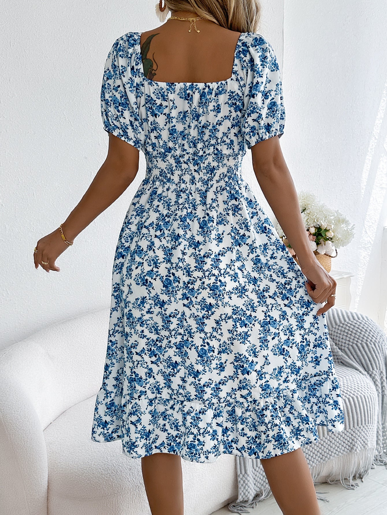 Women's floral print square collar dress with ruffle details, perfect for summer fashion and casual outings.


