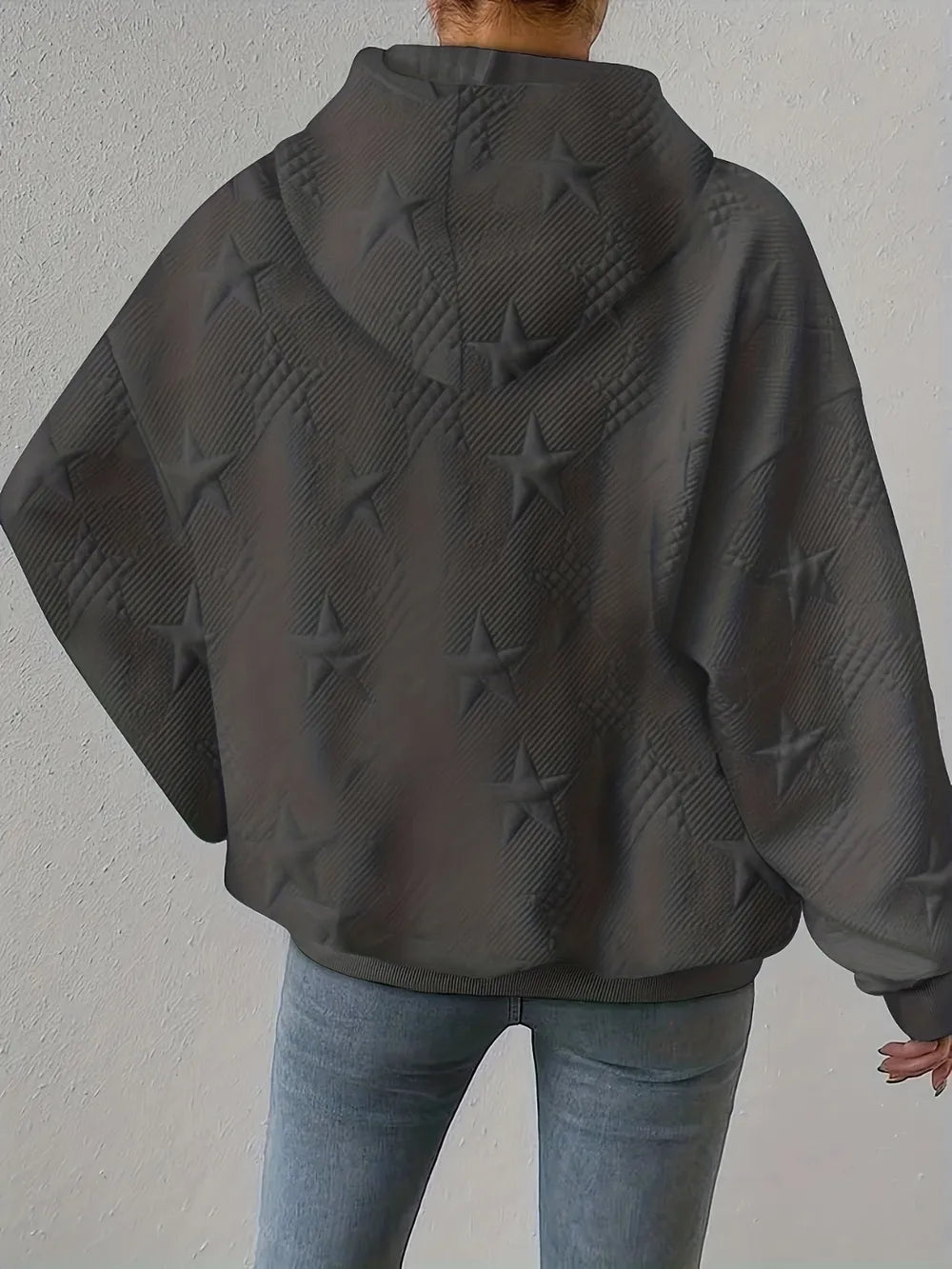 White women’s casual pullover hoodie with star texture and drawstring hood.









