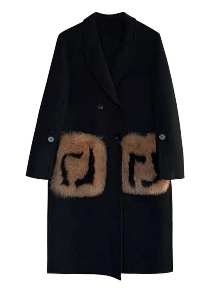 Woman wearing a solid minimalist woolen coat with a cozy scarf and boots