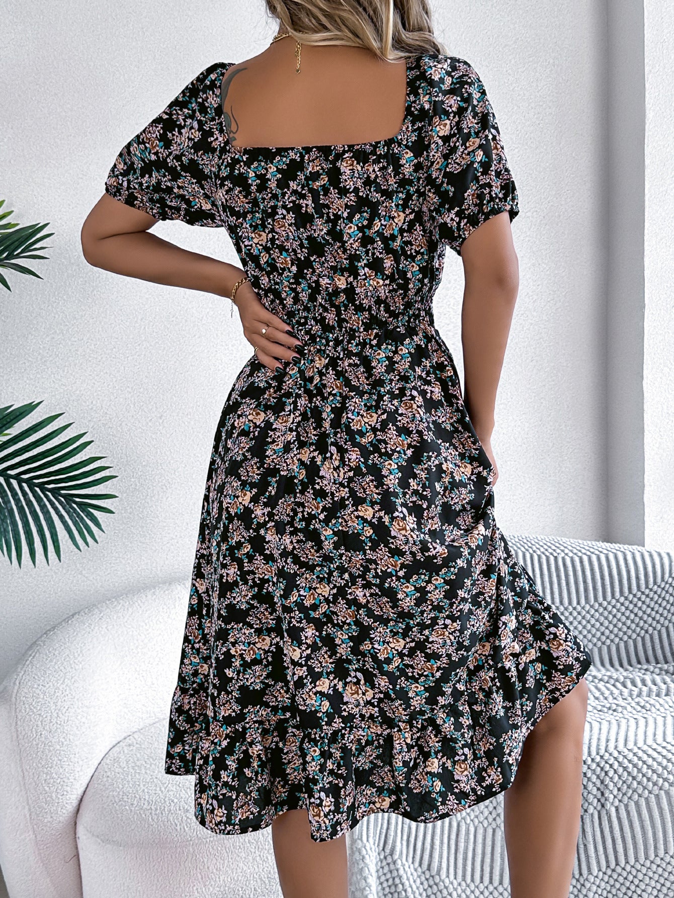 Women's floral print square collar dress with ruffle details, perfect for summer fashion and casual outings.


