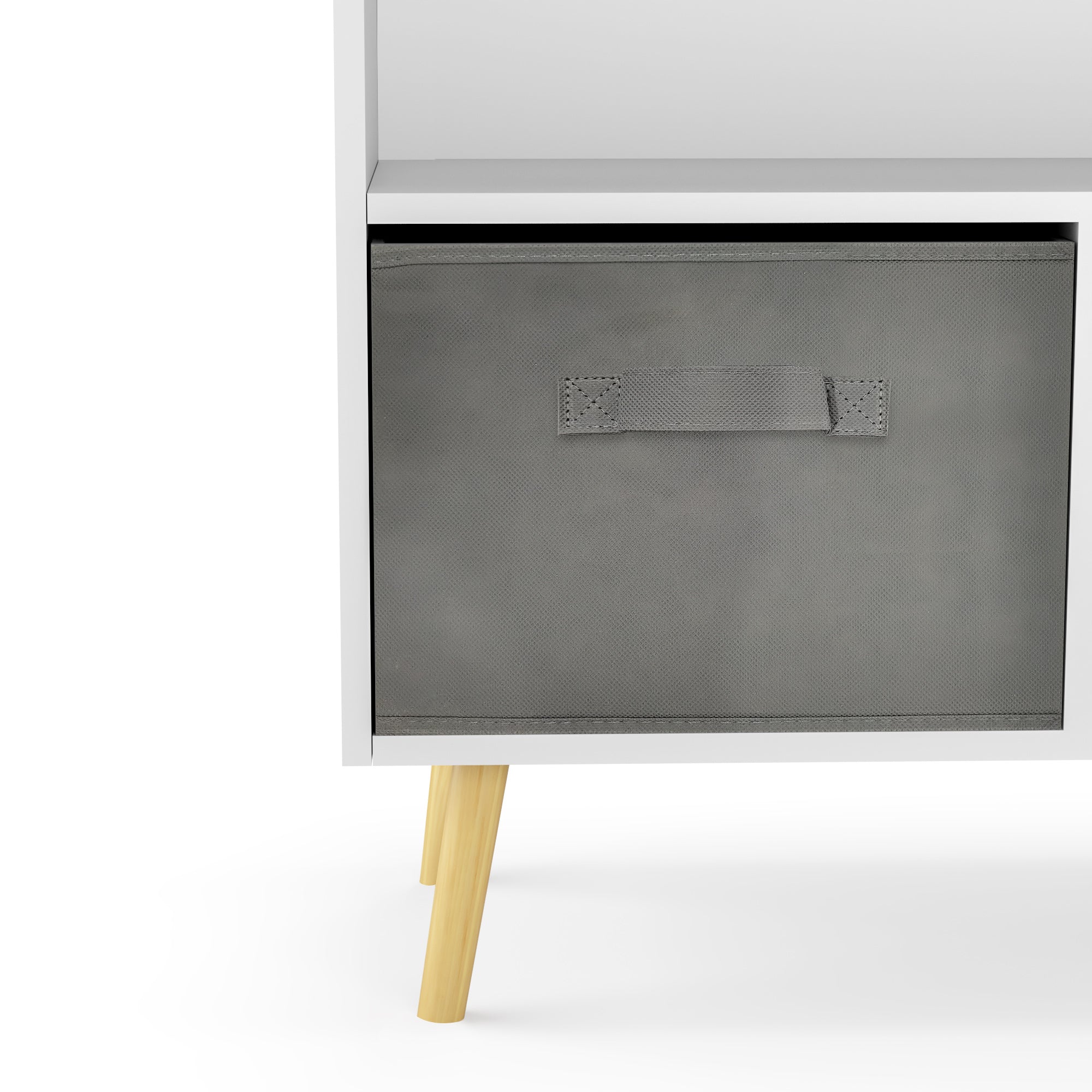 White kids bookcase with gray fabric drawers and books displayed