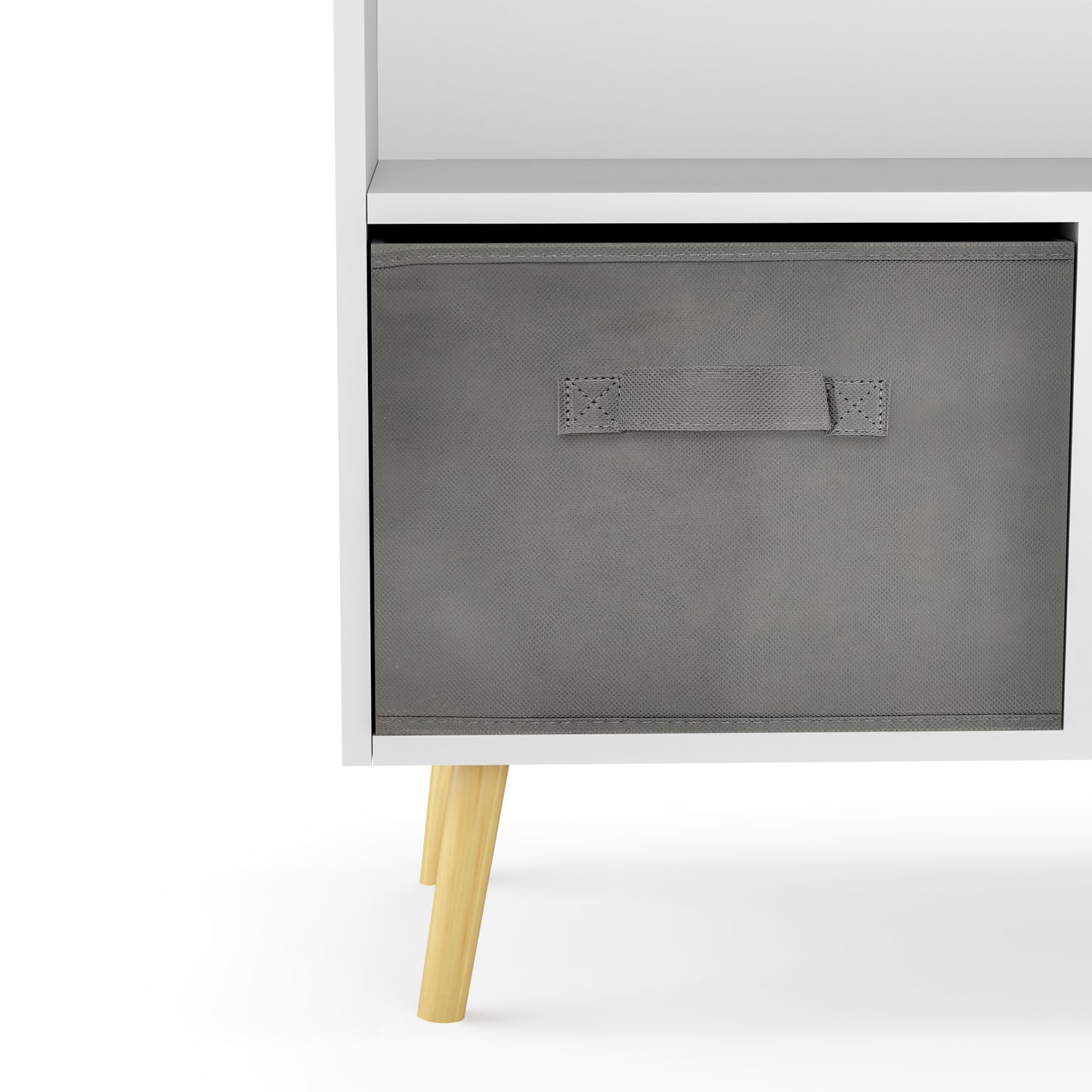 White kids bookcase with gray fabric drawers and books displayed