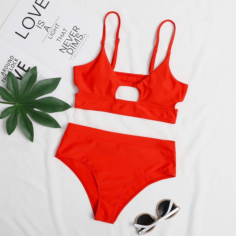 Surf Siren high-waist bikini featuring a retro-inspired design with a flattering high-waisted bottom for added comfort and support. Made from stretchy, durable fabric, perfect for beach days, poolside lounging, and stylish summer fun.