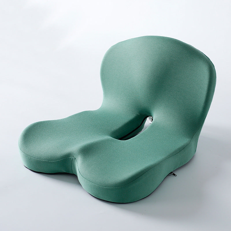 Memory foam ergonomic cushion with integrated back and seat support on an office chair

