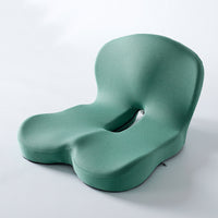 Memory foam ergonomic cushion with integrated back and seat support on an office chair

