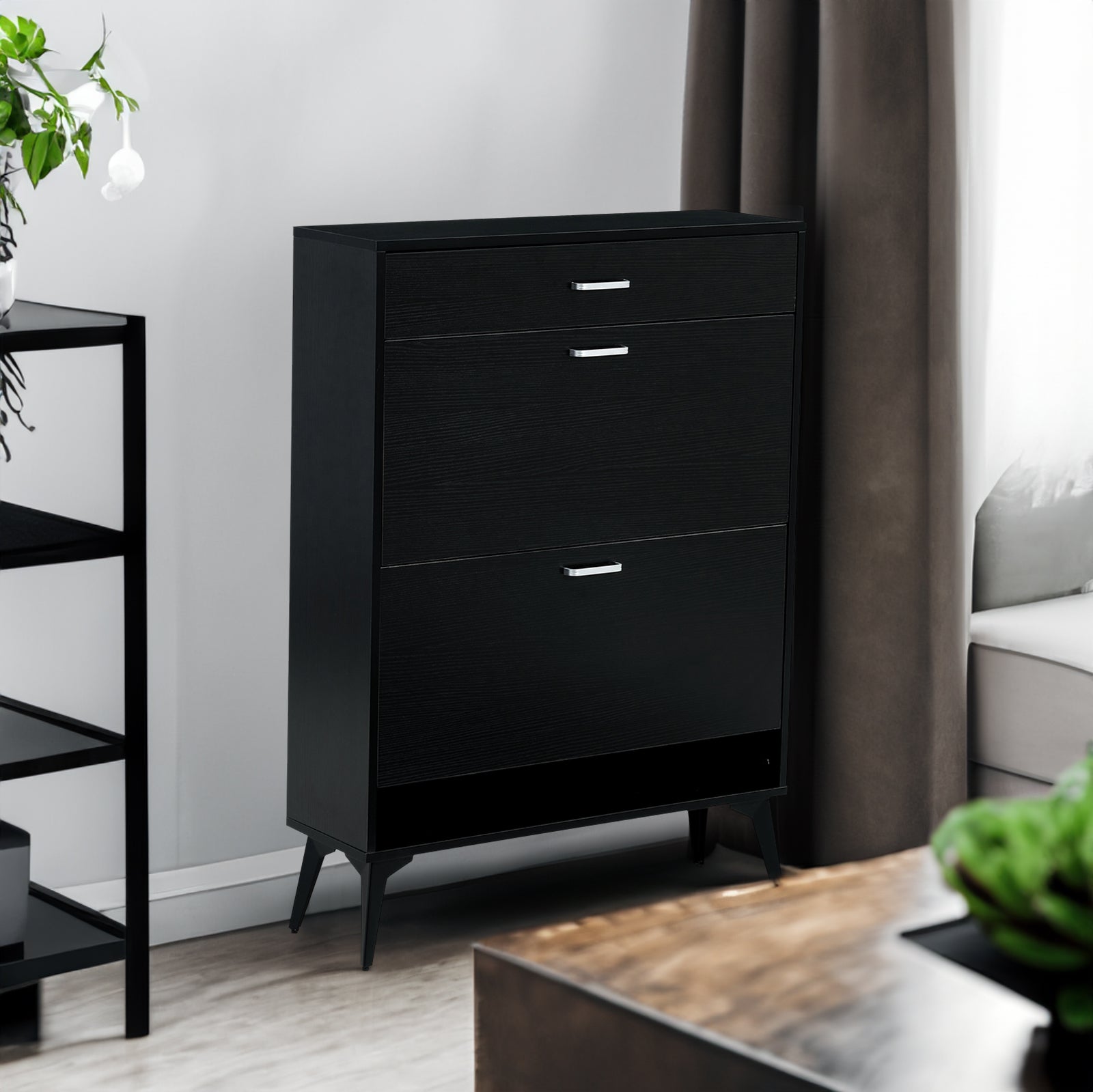 Black shoe cabinet with open shelves for footwear storage