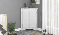 White triangle bathroom storage cabinet with a compact, space-saving design, featuring multiple shelves for organizing toiletries, towels, and other bathroom essentials. Made from durable materials, this sleek cabinet adds a functional and stylish touch to any bathroom decor.