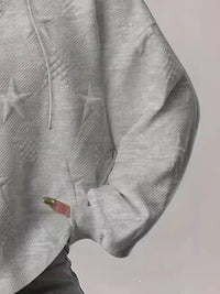 White women’s casual pullover hoodie with star texture and drawstring hood.








