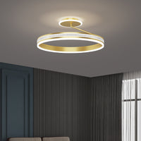 Modern minimalist bedroom with soft-glow ceiling light and clean interior design

