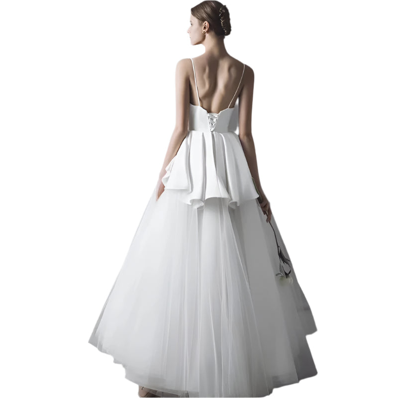 Elegant plus-size wedding dress with lace detailing and a flattering silhouette for modern brides.

