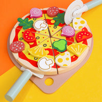 Children's wooden play kitchen set with pizza, fruits, and vegetables

