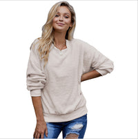 Women's solid color pullover, long-sleeve round-neck loose casual top for autumn and winter.








