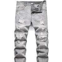 Front angle of men's motorcycle jeans with ripped detailing and slim-fit cut
