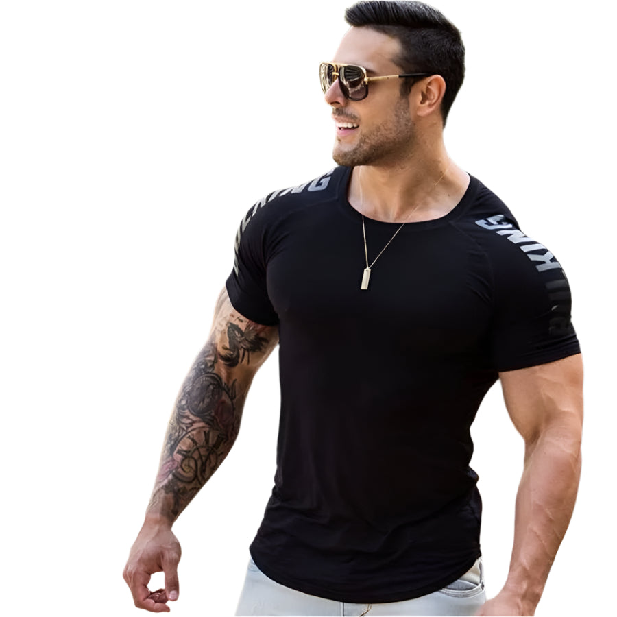 Man wearing a tight-fit short sleeve compression T-shirt in quick-dry fabric for running and sports training.

