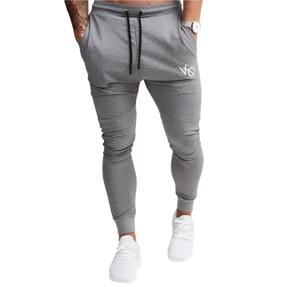 Men’s joggers made from soft, stretchy fabric, featuring an elastic waistband and cuffed ankles, perfect for casual wear or active workouts