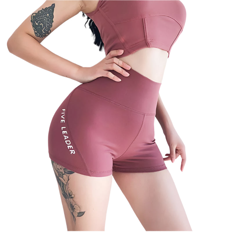 Women’s quick-dry running shorts made from moisture-wicking fabric, featuring an elastic waistband and lightweight design for comfort and performance during runs.