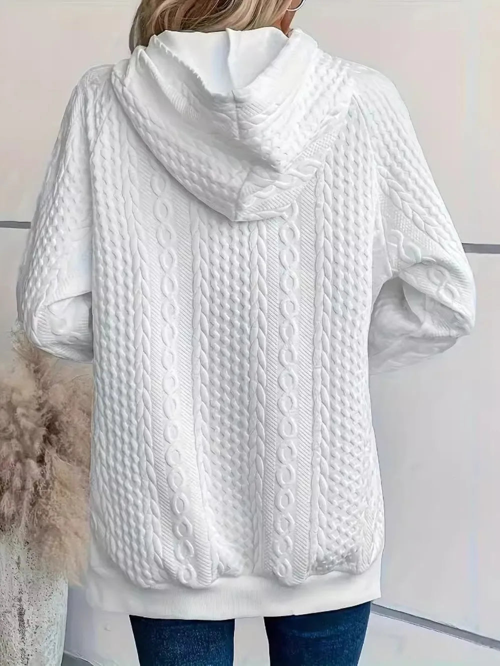 Women's oversized solid color hoodie with long sleeves, front view

