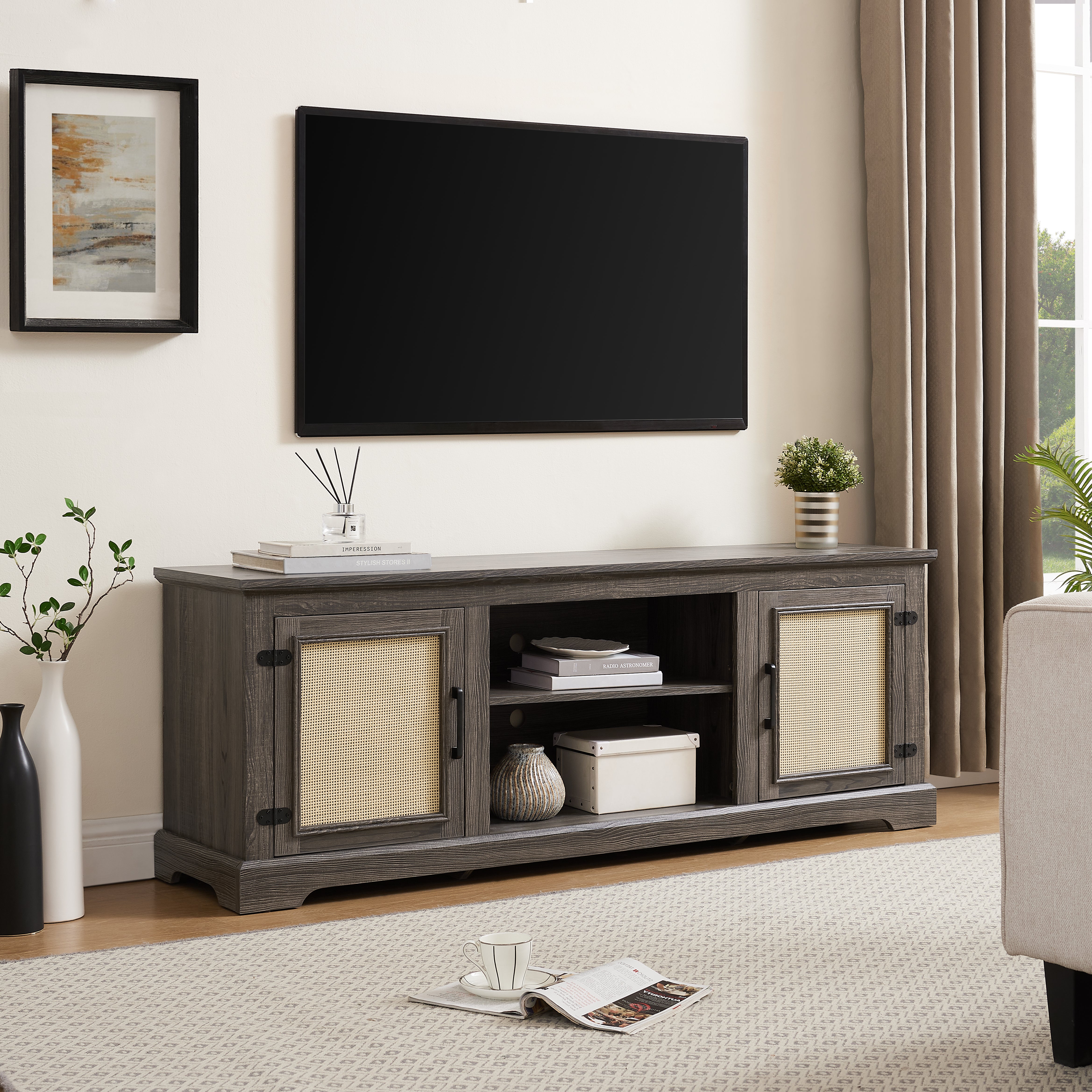 Gray TV stand with rattan doors and shelves for storage