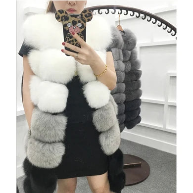 Woman wearing a colorful patchwork faux fur vest in winter setting
