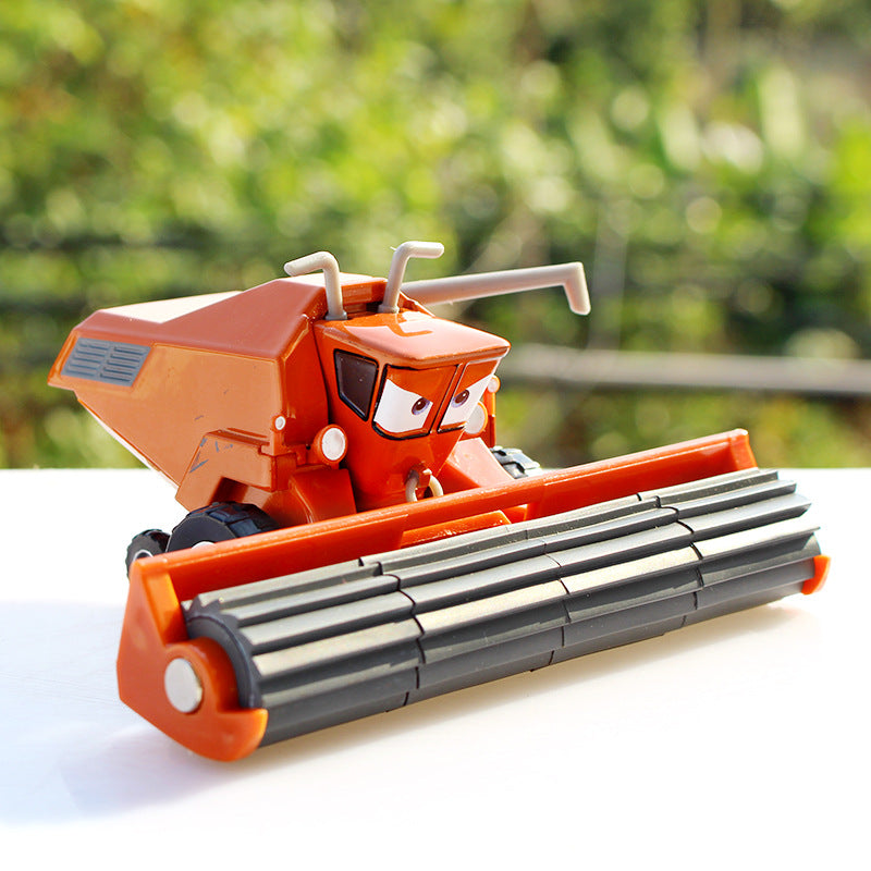 Alloy toy set featuring a racing car, harvester, and an Uncle Cow figure, made of durable metal with detailed paintwork and movable parts, designed for children ages 3 and up