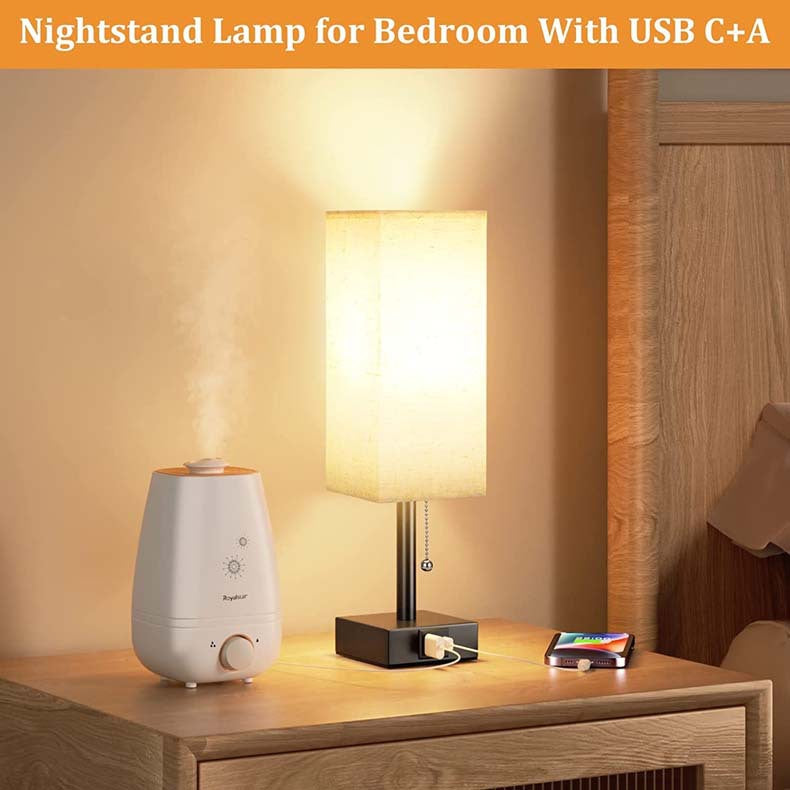 Modern square linen desk lamp with USB charging ports and 3-color dimmable lighting on a minimalist nightstand

