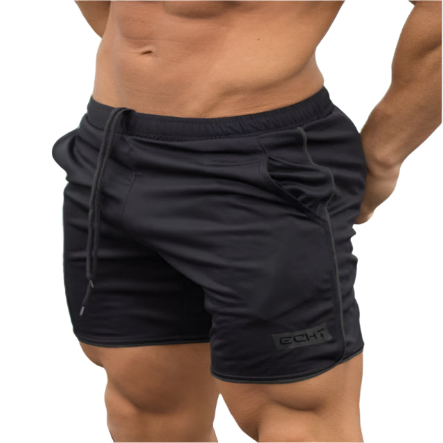 "Men’s quick-dry running shorts made from moisture-wicking fabric, featuring an elastic waistband and lightweight design for comfort and performance during runs."