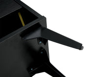 Black shoe cabinet with open shelves for footwear storage