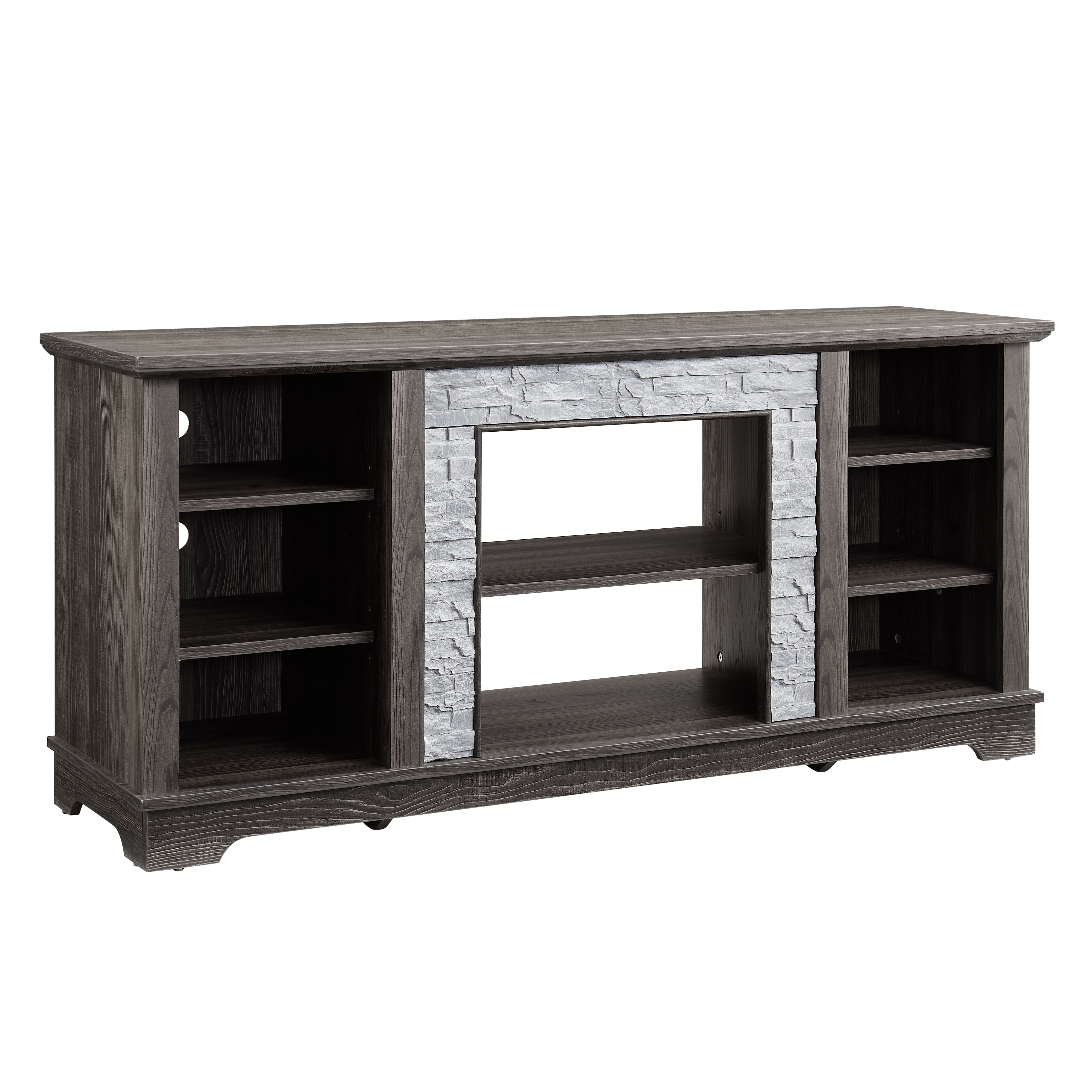 Modern gray stone TV console with open shelves and stacked stone frame