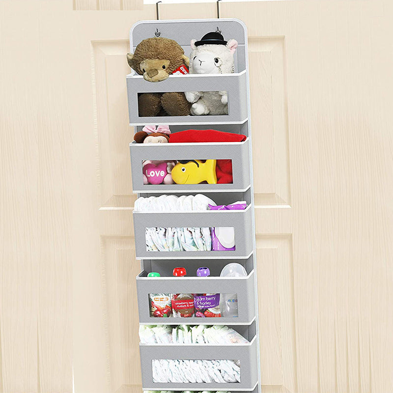 5-pocket hanging organizer on the back of a white bedroom door

